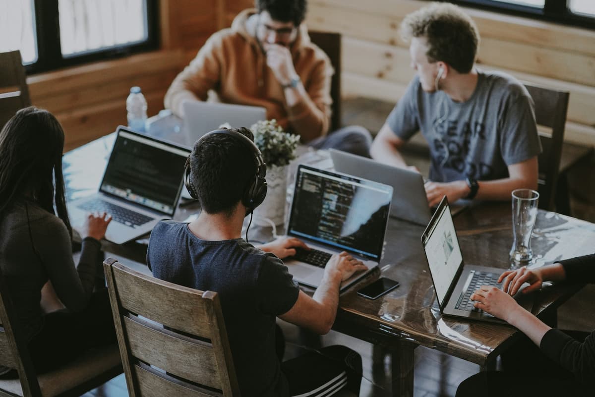 Qoodex team collaborating